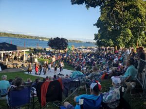 People dancing at the waterfront stage