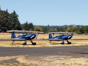 2 twin bi-planes on the airport field